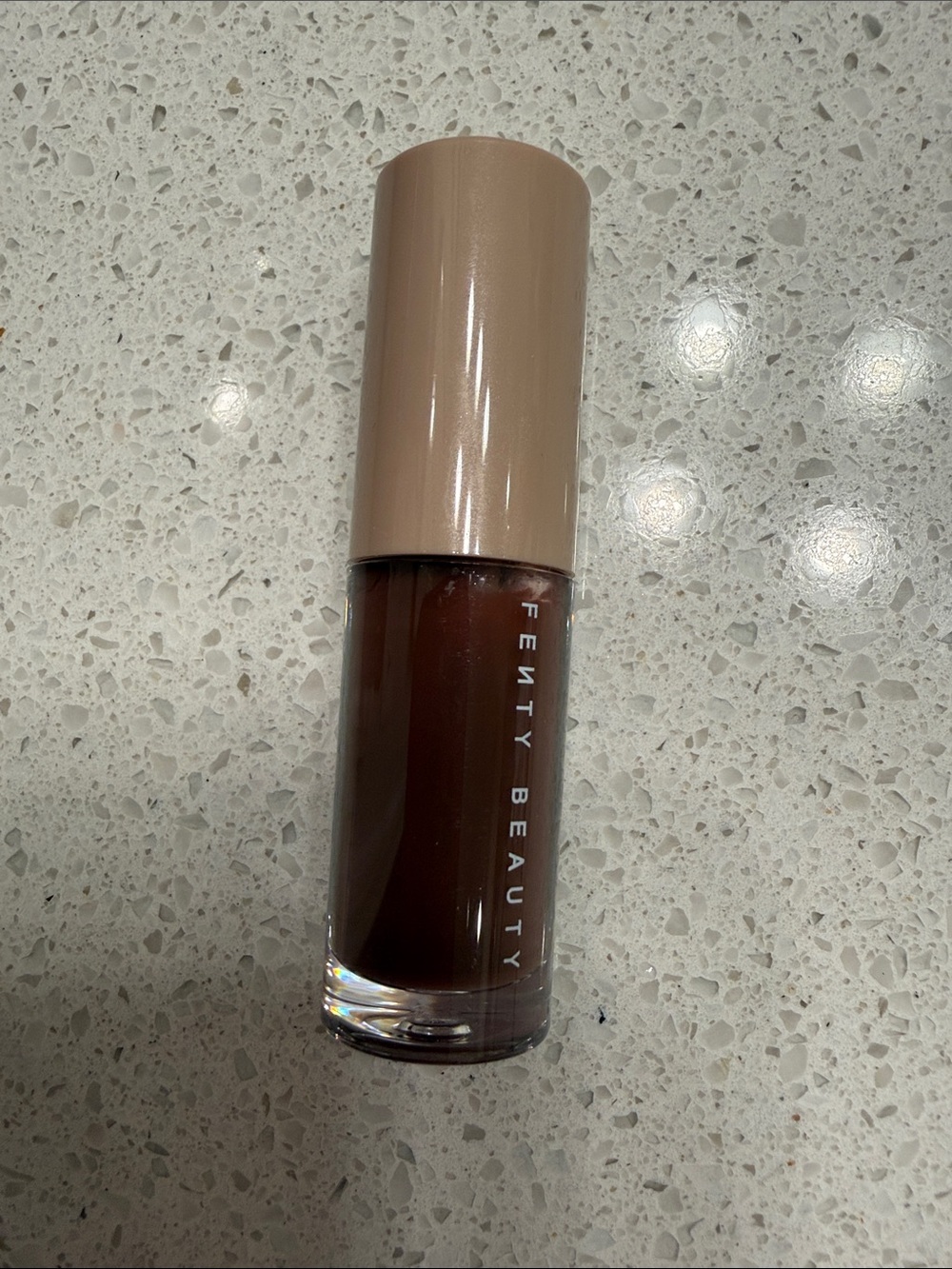 Fenty Beauty gloss balm in the shade hot chocolate heat mini size